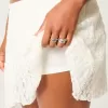 Lace Asymmetrical Hem Mini Skirt