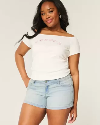 Low-Rise Light Wash Denim Shortie Shorts Low-Rise Light Wash Denim Shortie Shorts