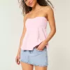 Low-Rise Pink Embroidered Light Wash Denim Mini Skort
