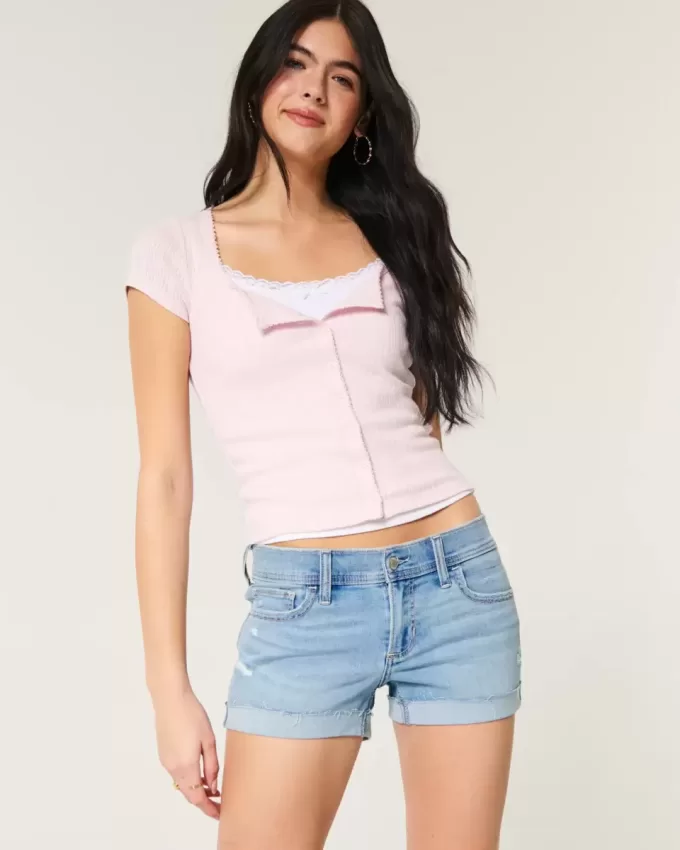 Low-Rise Ripped Light Wash Denim Shortie Shorts