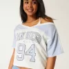 Oversized Off-the-Shoulder Varsity San Diego Graphic Tee Oversized Off-the-Shoulder Varsity San Diego Graphic Tee